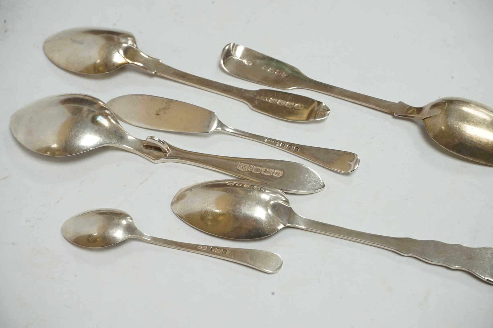Six assorted items of silver cutlery, including a modern silver preserve spoon and two 19th century teaspoons, 3oz. Condition - fair